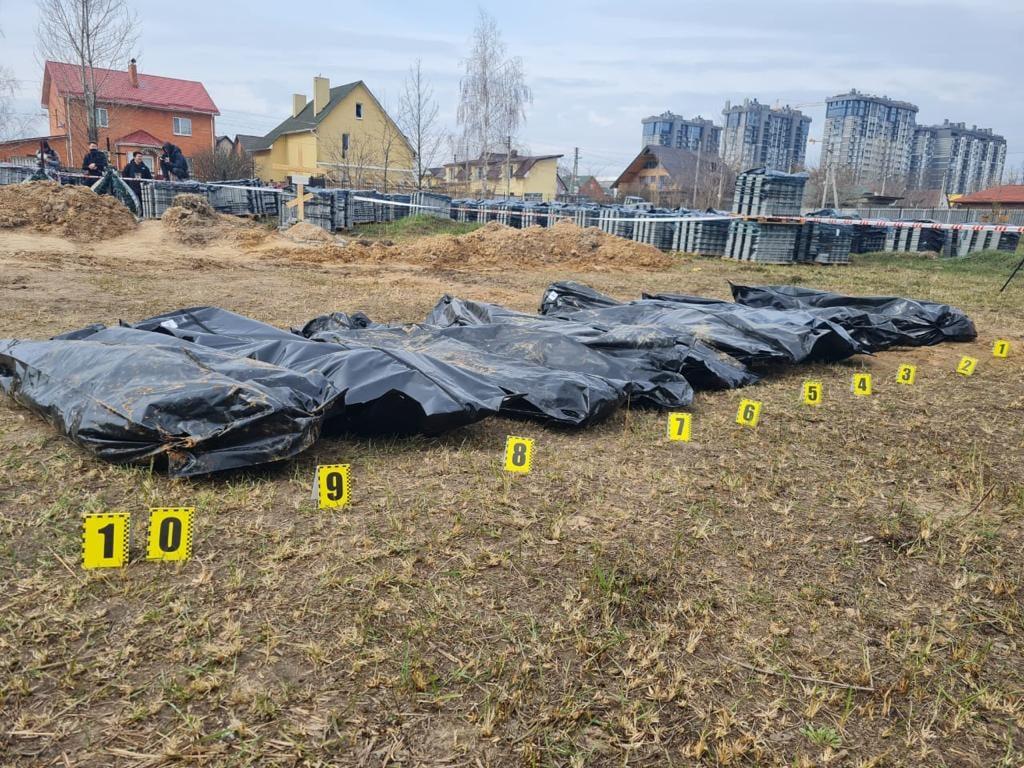 звірства окупантів на київщині братська могила